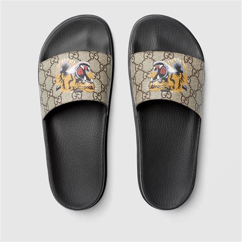 gucci tiger slides on feet|tiger slide Gucci supreme.